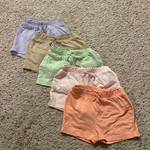 H&M, 9 Months pack of shorts in variety of colors.